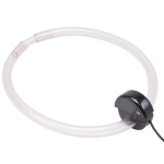 Picture of clear plastic tube in a circle connected to a small round black device with a cord leading out from it.