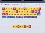 Screenshot of a keyboard, with keys colored yellow, red, and blue and letter tiles in a row at the bottom.