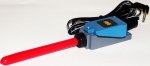 A red want attached to a blue and gray switch with black cord for plugging in.