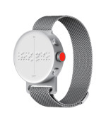 A silver watch and band with braille on the face and push buttons on the right.