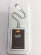 A rectangular black-and-white device with the Hook+ logo and a lighting connector.