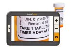 Rectangular, handheld device with large display and operating buttons along right side and magnified image of medication on screen.