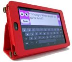Rectangular handheld device with a red case and a text input screen with a keyboard on the display. It is sitting upright against a stand.