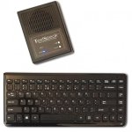Small wireless keyboard and small rectangular speaker.