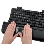 keyboard with extension that has mouse controls under space bar