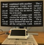 Magnifier with HDMI output plugged into left side. Magnifier is placed over a newspaper article with light shining to highlight the area being viewed. Magnified section of article displayed on LCD screen with white letters and black background.