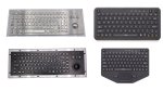 Various models of rugged keyboards. Two resemble standard keyboards, but they feature a built-in trackpad or a trackball embedded in the bottom right corner. The other two models are mini-sized; One model is a standard compact keyboard without the numeric keypad on the right-hand side; the second mini model is smaller (its keys are similar-sized to mid-2000s cell phone keyboards) with a small built-in trackpad. The keyboards are light silver, black with light silver trim, and black.