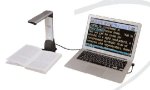 Laptop connected to a stand magnifier, with an open book underneath at the magnifier's base.