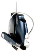 A black device resembling a router. It features a headset, microphone attachment, and antenna.