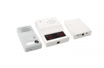 Three white-colored rectangular boxes with built-in speakers and input connections.