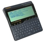 A black, medium-sized device resembling a calculator with a full QWERTY keyboard and large LCD display.