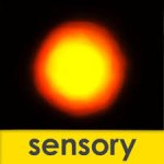 Large black square with yellow sun in center and orange ring around it and the word sensory in lower case on a yellow border on the bottom.