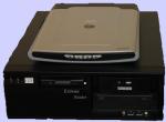 A medium-sized black and silver device resembling a DVD player.