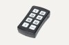 A black rectangular device with white buttons containing the numbers 1 through 6 and 2 other menu options.