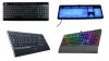 Various models of illuminated keyboards. The devices are the same as standard keyboards, but with backlit keys. Some versions feature multi-colored backlighting (rainbow colors throughout the keyboard or else different colors in different sections), while others feature standard white backlighting. One model is much brighter than the others. Two of the models feature built-in wrist support bars on the bottom edge.