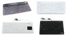 Various models of medical keyboards. Most models resemble standard keyboards. One model features a fingerprint scanner (resembles a barcode scanner) on the top left corner. Another includes a black built-in touchpad on the bottom right corner, near the arrow keys. One of the models is a mini medical keyboard and is shorter in length than a standard size. This model also features a built-in palm rest on the bottom edge. Two models are white; one is medium grey; and the fourth is black.