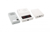 Three white-colored rectangular boxes with built-in speakers and input connections.